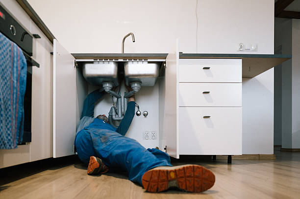 Professional Emergency Plumber technician working in Fulton, OH